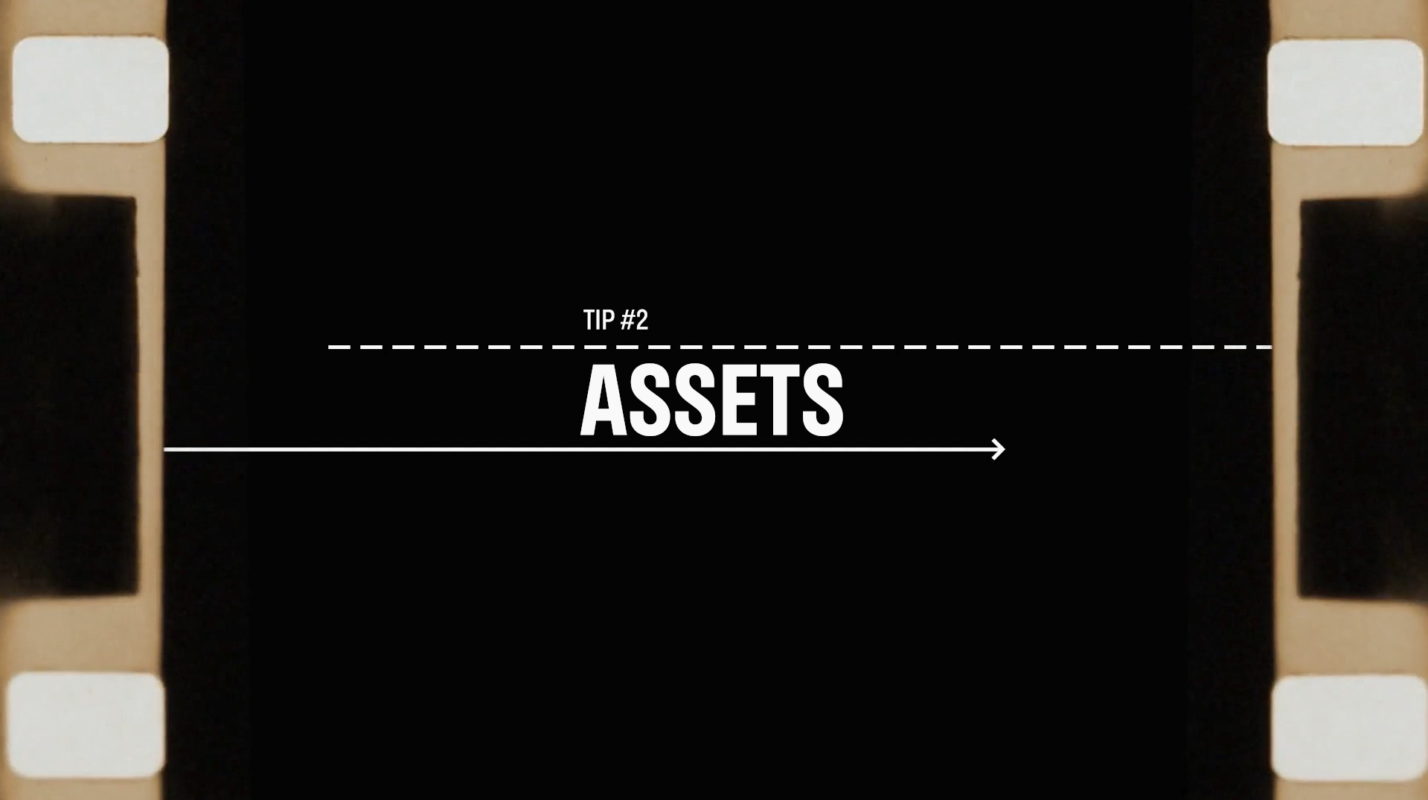 Image of a black background with film strips on either side and white text in the middle that reads Tip #2 - Assets. Watch your assets when developing a signature visual aesthetic.