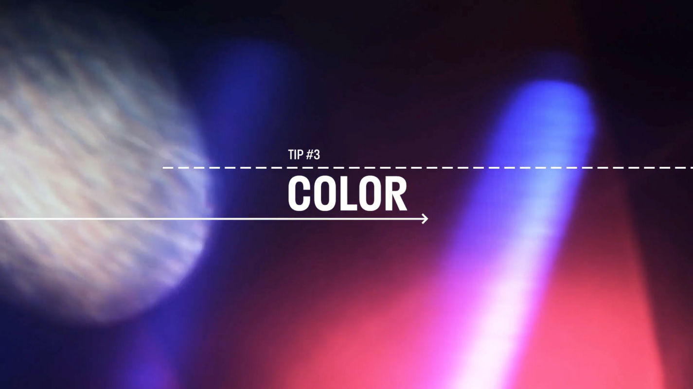 Image of an abstract light with vivid shades of red, purple, and pink shown. White text over the image reads Tip #3 - Color. Use color to your advantage when developing a visual aesthetic.